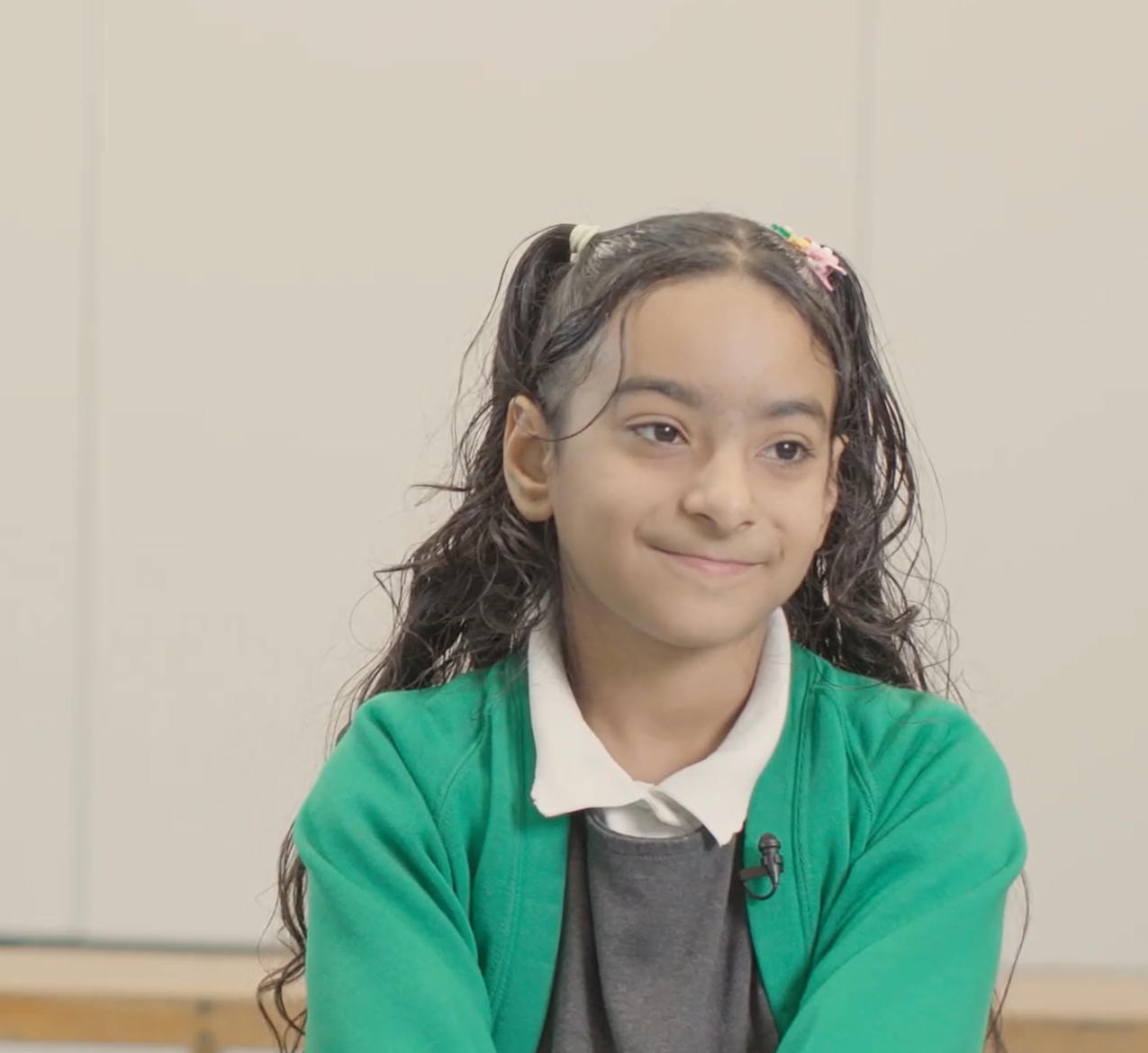Photo of a smiling schoolchild Aisha, year 5