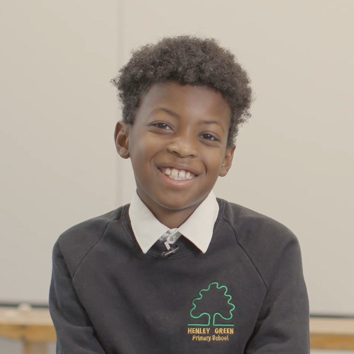 Photo of a smiling schoolchild Djaniro, year 6